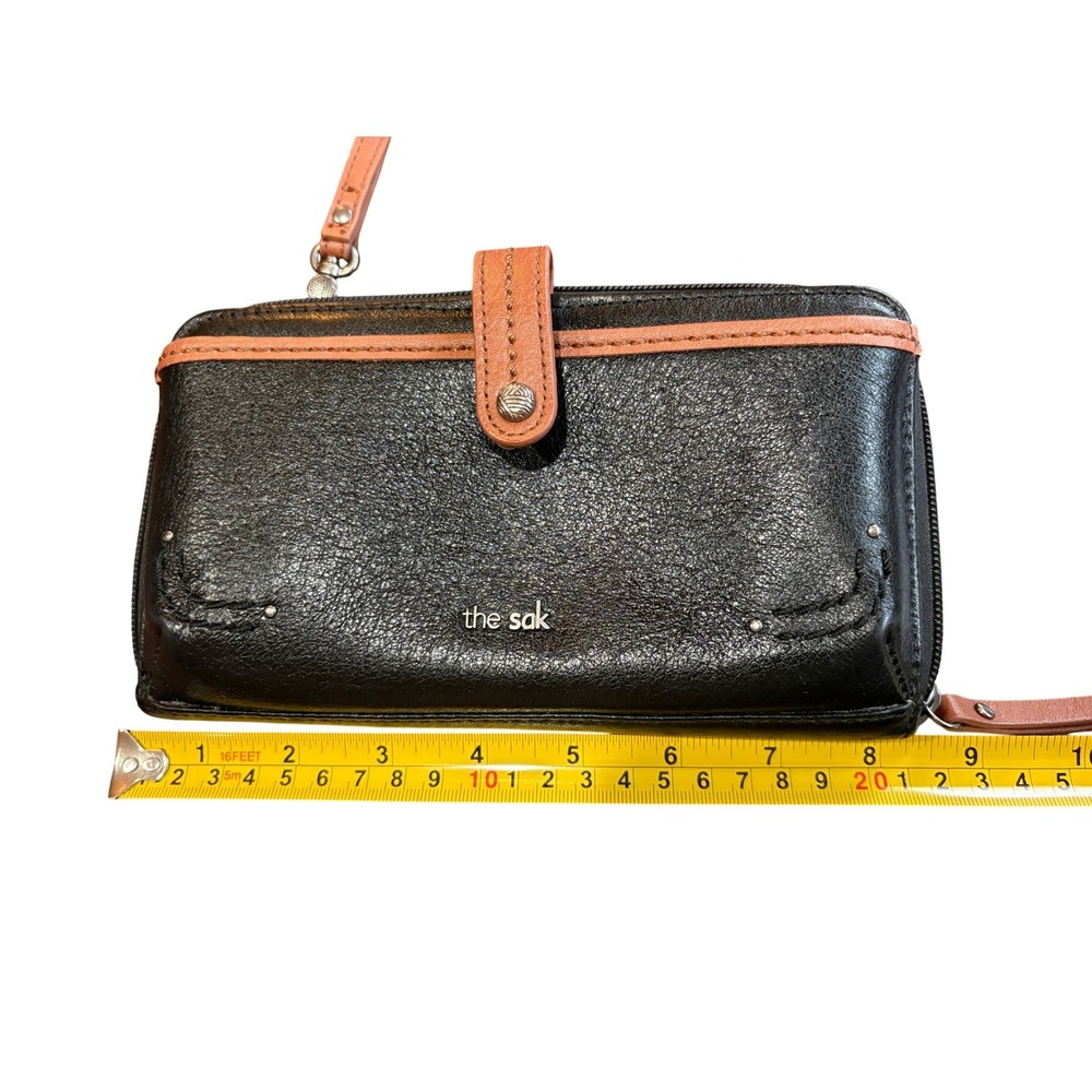 The Sak Iris Leather Wristlet Wallet Black Tan Trim Zip Around Clutch